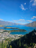 Women exploring Queenstown lakefront on a women's group adventure with Wander Beyond Co. Hosted Women's Group Travel